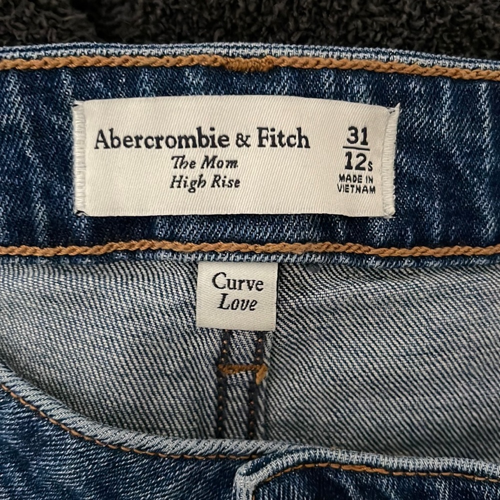 Never worn. Tags cut